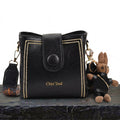 Bolso tipo Satchel + Muñeco Arion de regalo