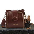 Bolso tipo Satchel + Muñeco Arion de regalo